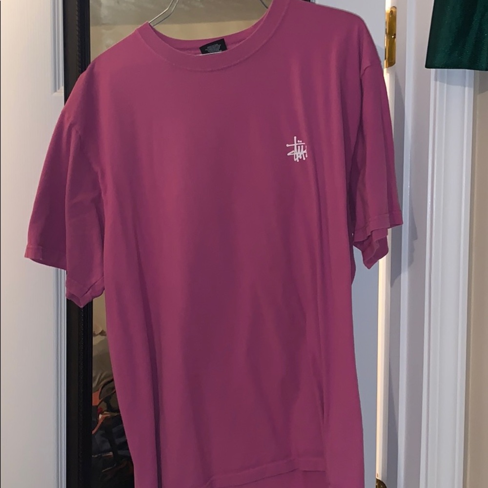 Stussy pink shirt.